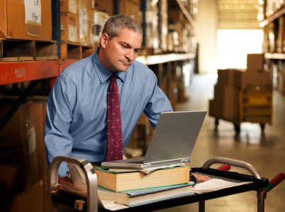 Man on laptop involved in shipping--iStock_000015954827XSmall.jpg